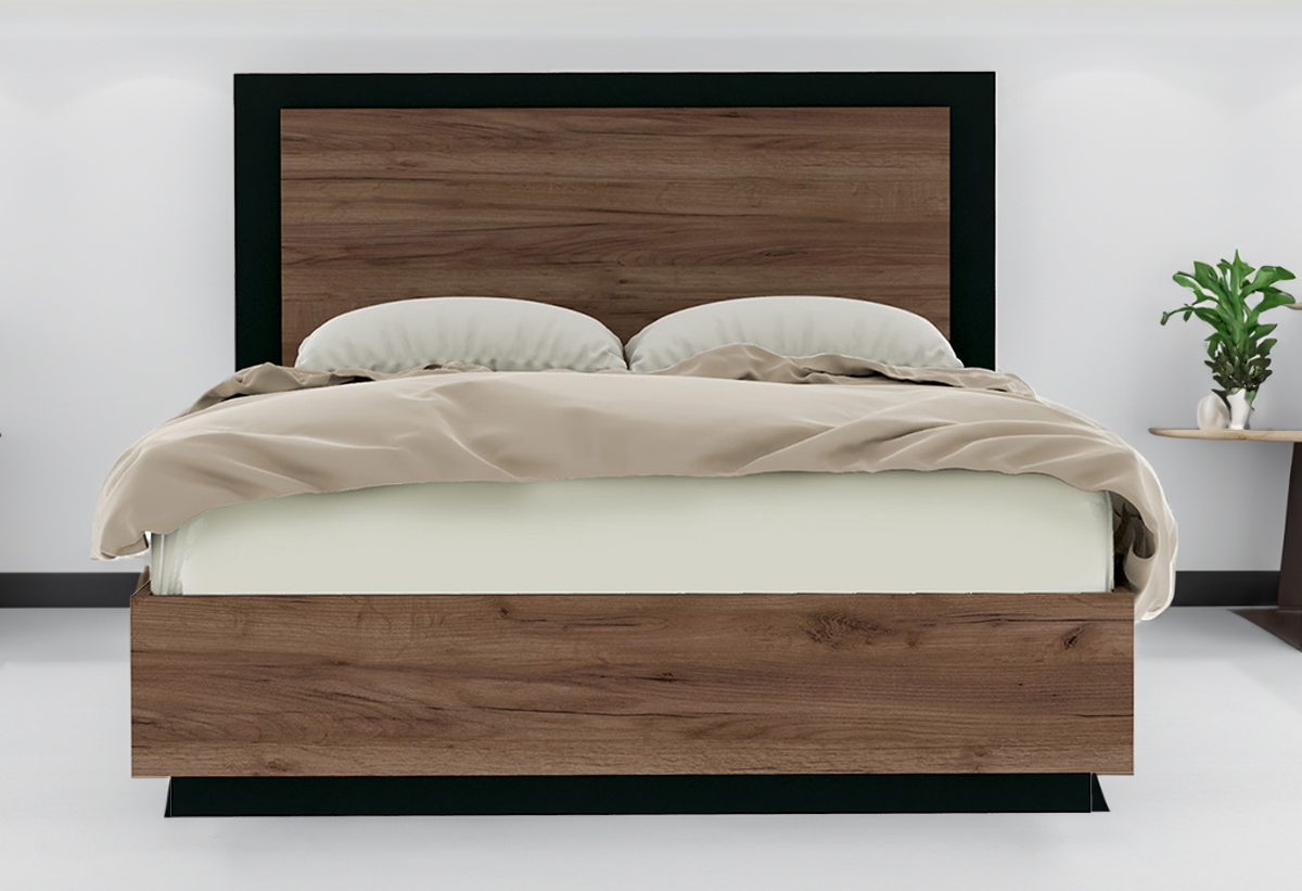 Απεικονίζεται το κρεβάτι τοποθετημένο σε ένα υπνοδωμάτιο